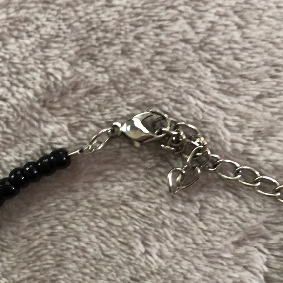 Zebra beaded necklace with matching earrings. - Picture 4 of 6